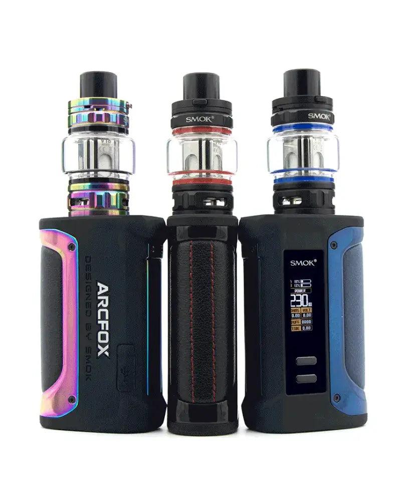 Three SMOK ARCFOX vape devices side by side on a white background, showing different color options: a holographic rainbow tank, a black tank with red accents, and a black tank with blue accents.